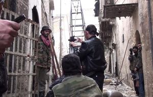 Combatir sin esperanza en las calles de Alepo: 'La revolución siria se acabó. Hemos perdido'