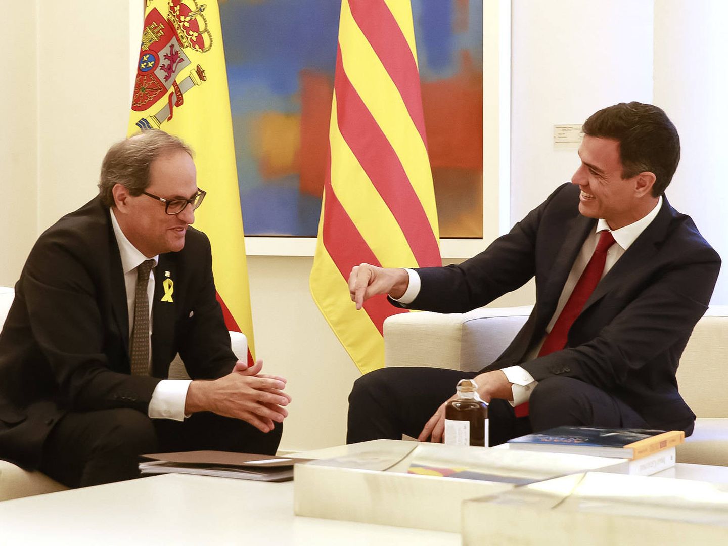 El presidente del Gobierno, Pedro Sánchez, y el jefe del Govern, Quim Torra, durante su reunión en la Moncloa del 9 de julio de 2018. (Moncloa)