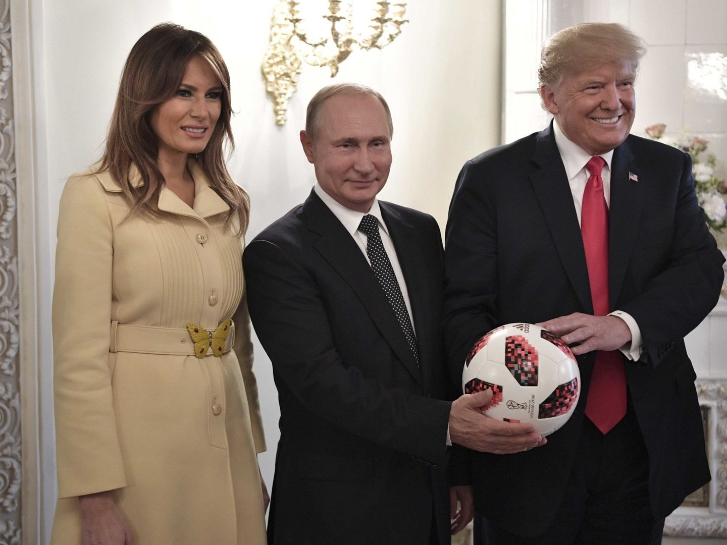 Melania Trump, Vladimir Putin y Donald Trump. (EFE)