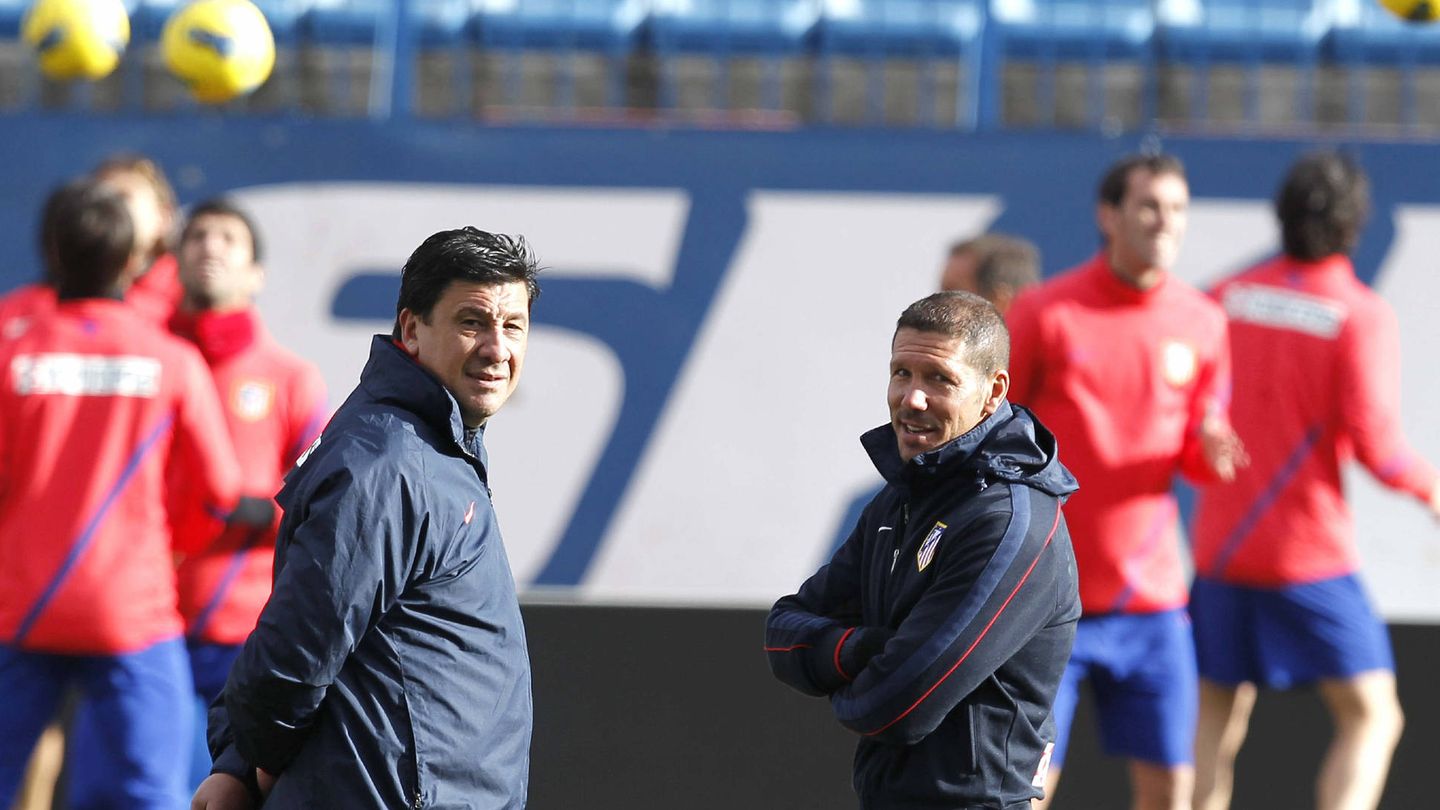 Burgos y Simeone, segundo y primer entrenador del Atlético desde diciembre de 2011.