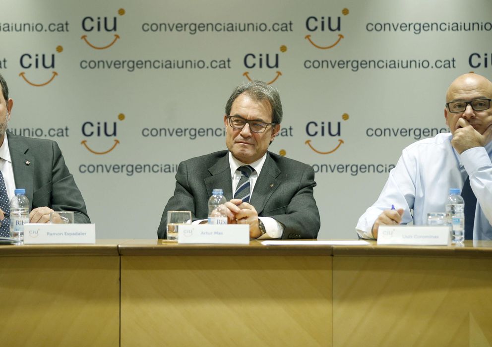 Foto: El secretario general de UDC, Ramon Espadaler; el presidente de Convergència, Artur Mas; y el vicesecretario de organización, Lluís Corominas. (EFE)