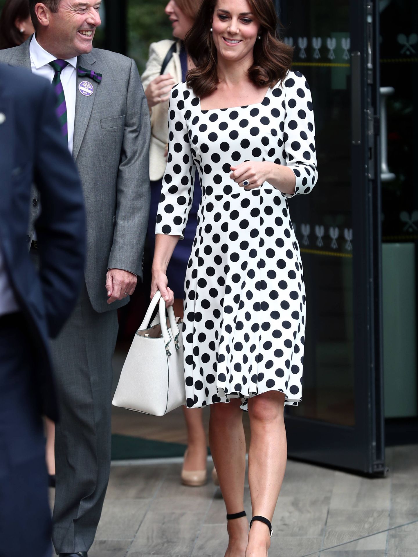 Kate Middleton, Duchess of Cambridge with Sir Philip Brook attending Wimbledon Championships in Wimbledon.