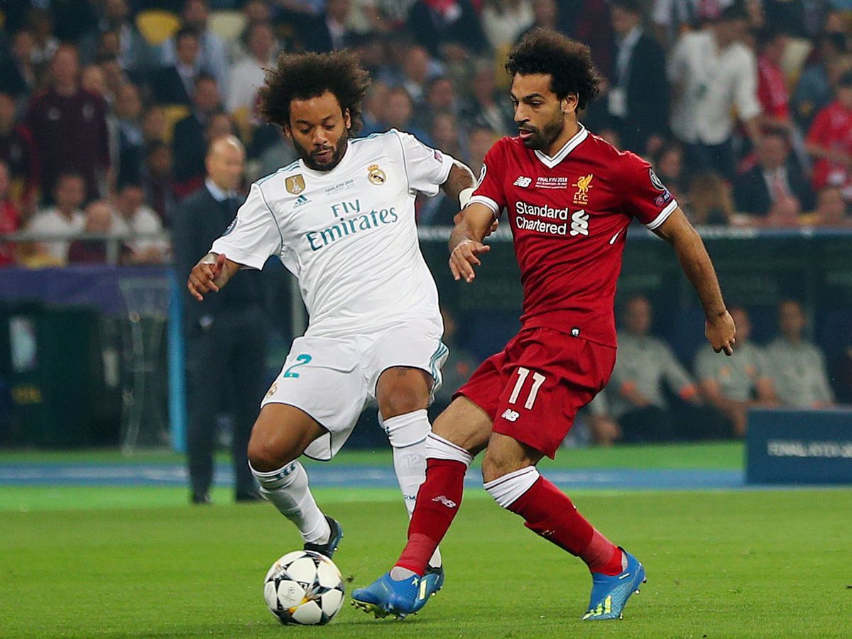 Foto: Marcelo, ante Salah, en la final de la Champions contra el Liverpool en 2018. (Reuters)