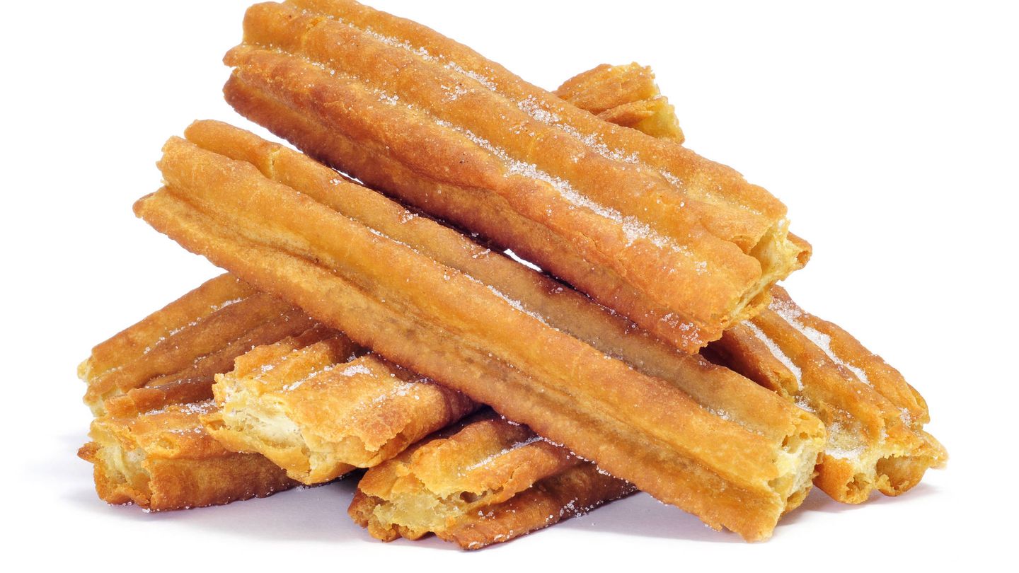 a pile of porras, thick churros typical of Spain