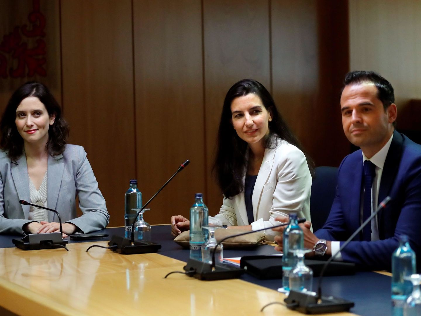 Isabel Díaz Ayuso, Rocío Monasterio e Ignacio Aguado, en un encuentro en Madrid. (EFE)