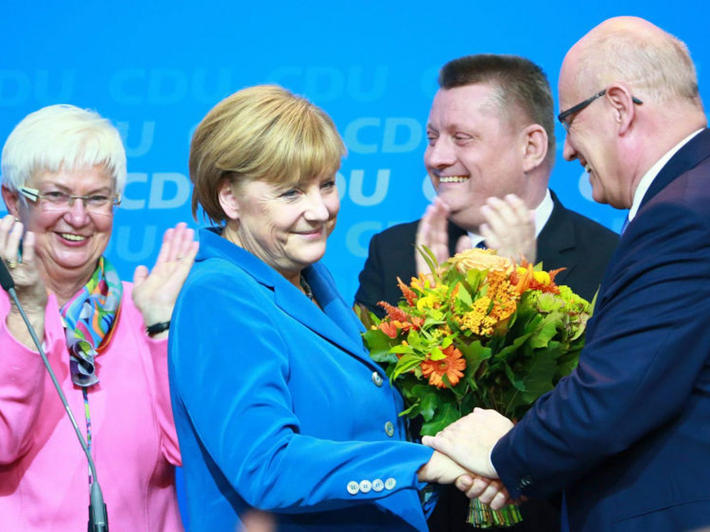 Merkel reacciona a los primeros resultados en su 'cuartel general' en Berlín (Efe).