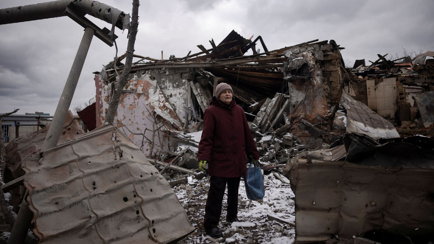 Nadezhda Prokopenko stands in front of the house of a relative that was destroyed in a Russian missile strike, amid Russia’s attack on Ukraine, in Selydove near Avdiivka, Ukraine, February 19, 2024. REUTERS Thomas Peter