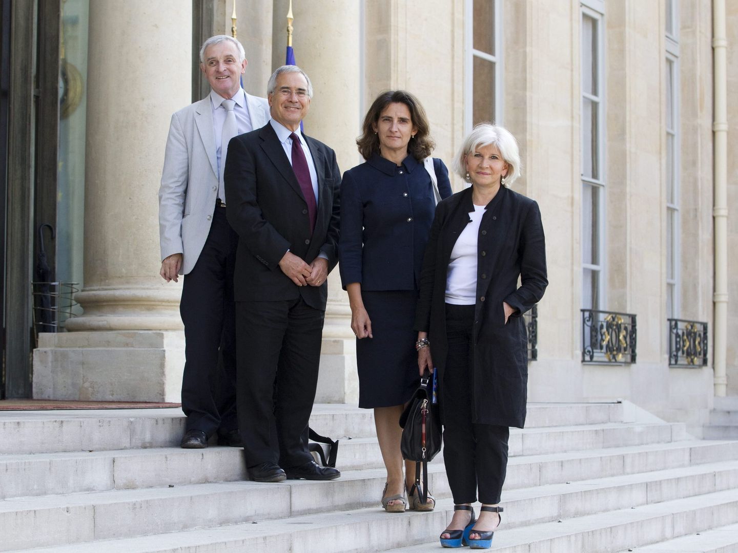 Teresa Ribera, con miembros del IDDRI, se reúne con François Hollande en el Palacio del Elíseo de París en julio de 2013 (Ian Langsdon / EFE)
