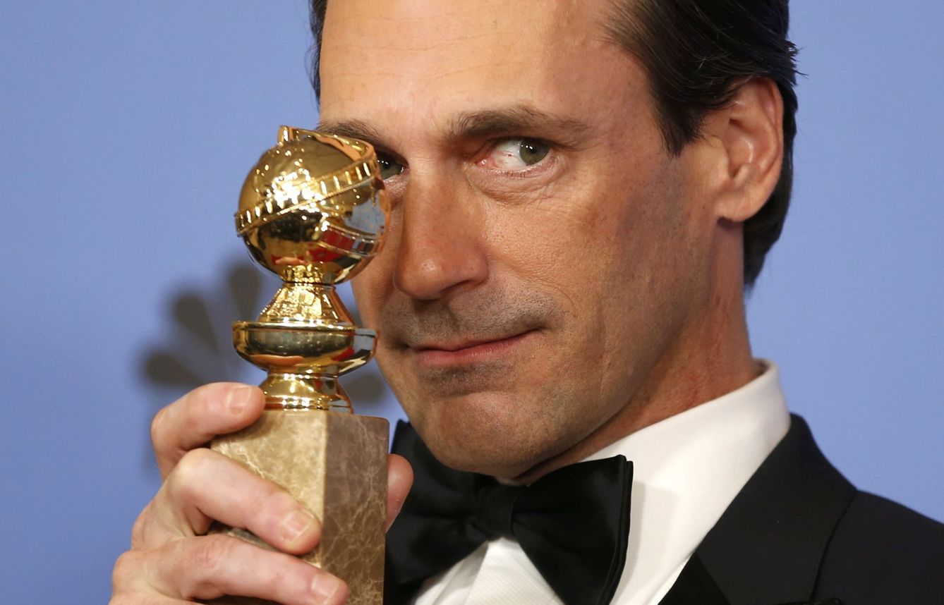 Jon hamm poses backstage with his award for best performance by an actor in a television series - drama for his role in 'mad men' at the 73rd golden globe awards in beverly hills