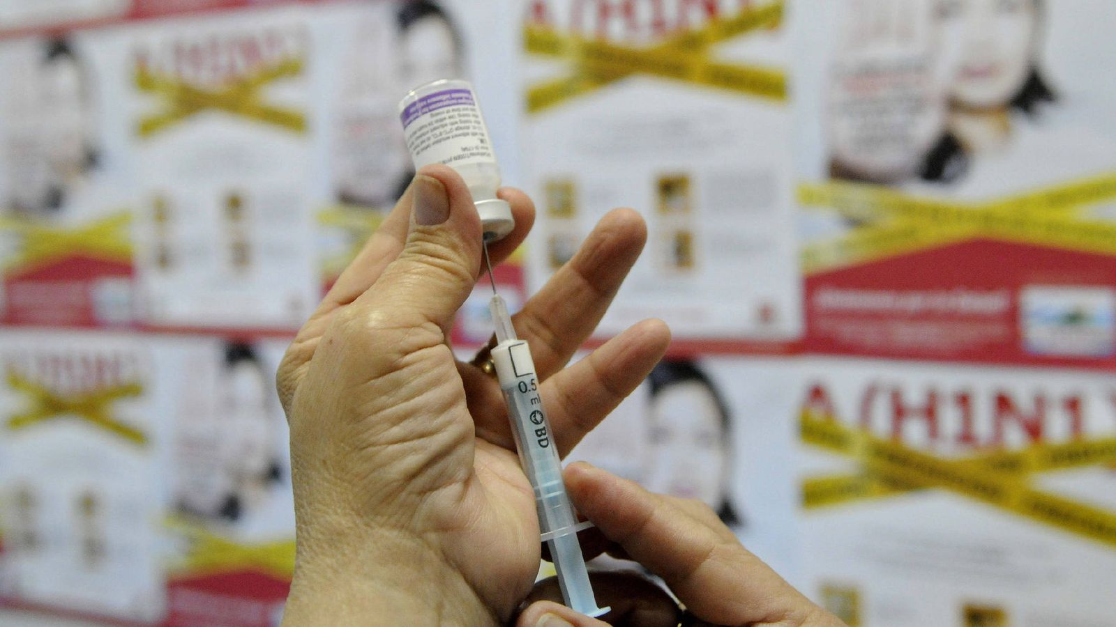 Foto: Jornada de vacunación contra la gripe A en El Salvador. (Efe/Roberto Escobar)