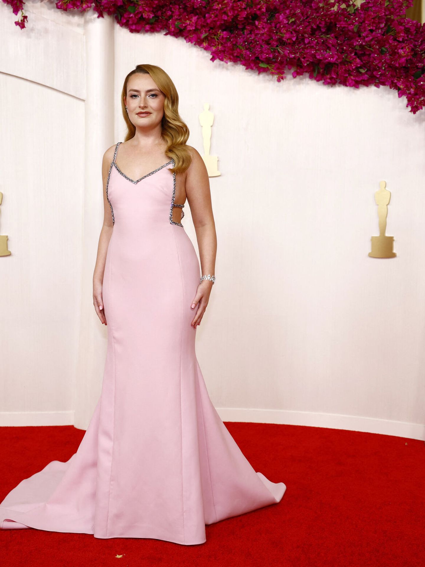 Amelia Dimoldenberg poses on the red carpet during the Oscars arrivals at the 96th Academy Awards in Hollywood, Los Angeles, California, U.S., March 10, 2024.