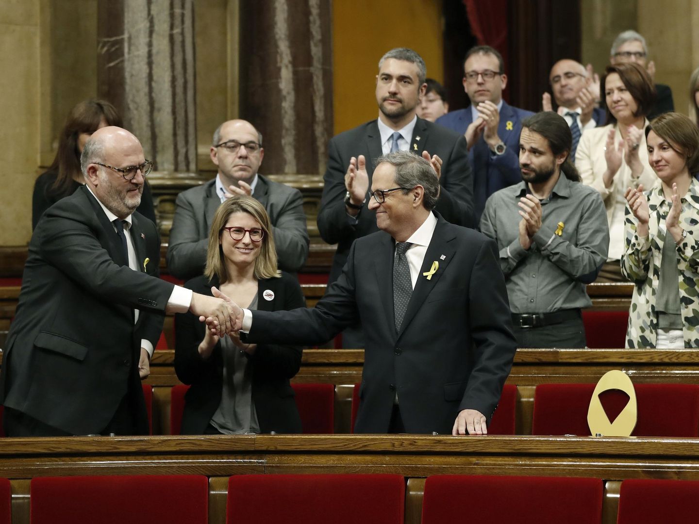 El candidato a presidente de la Generalitat por JxCat, Quim Torra, aplaudido por su grupo. (EFE)