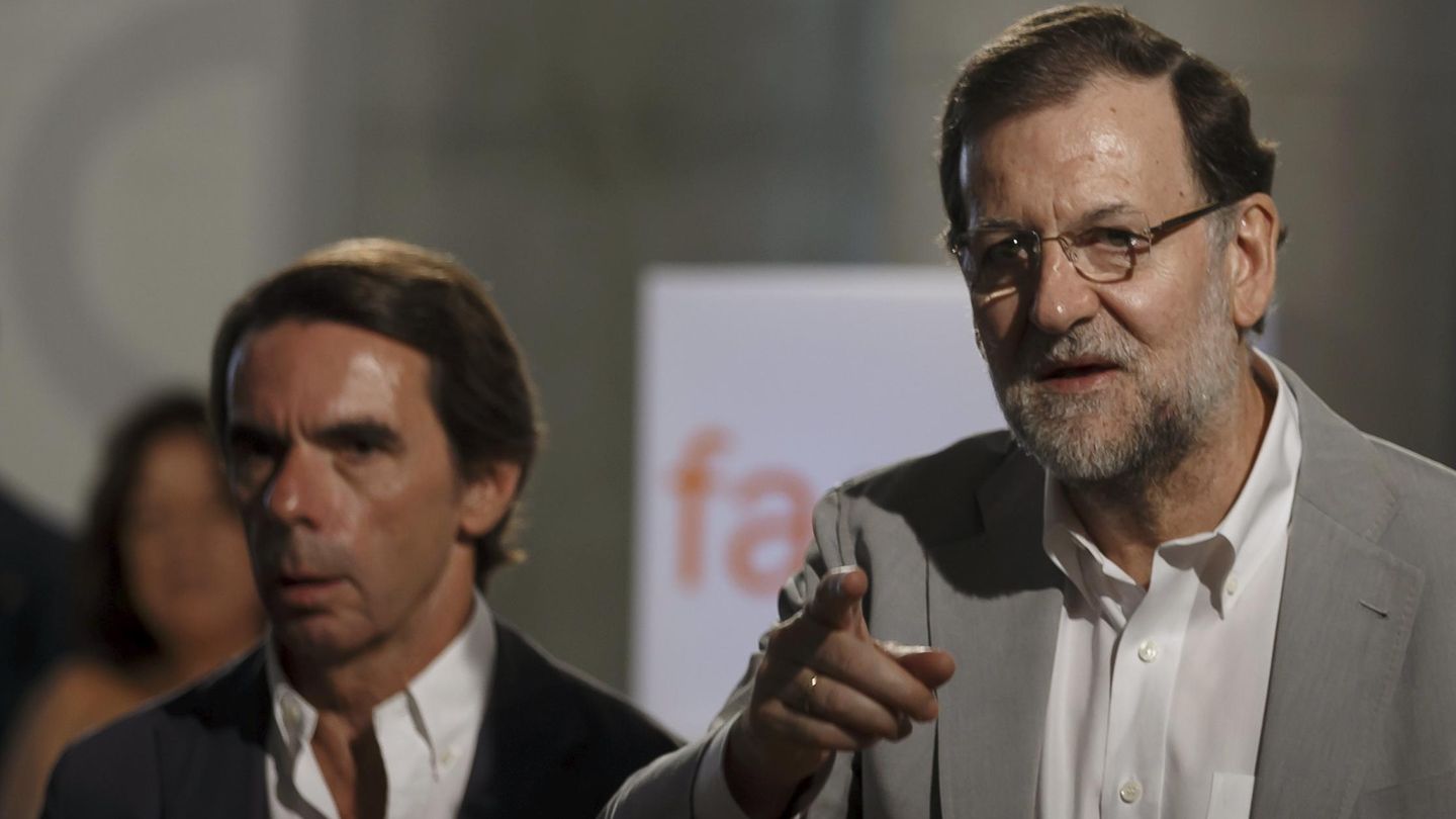 Mariano Rajoy y Jose María Aznar. (Reuters)