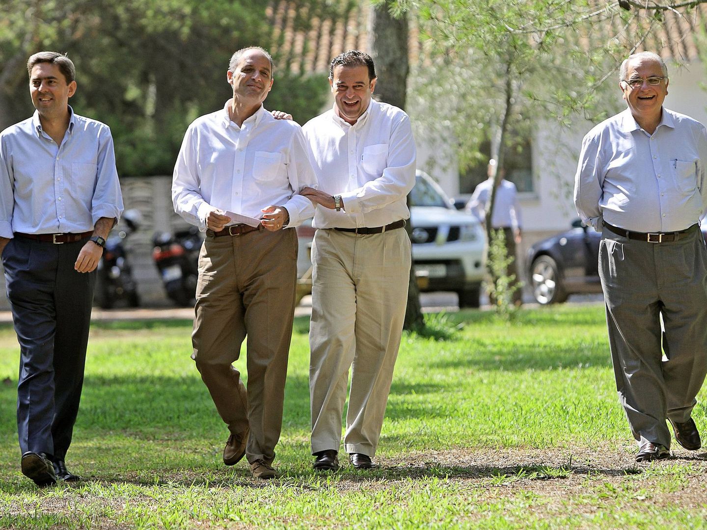 Vicente Rambla, Francisco Camps, Gerardo Camps y Juan Cotino, en el verano de 2010. (EFE)