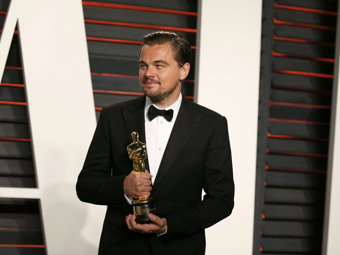 DiCaprio, recogiendo su Oscar | Reuters