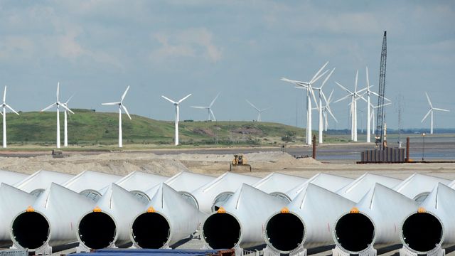 FILE PHOTO: Rotor-blades are pictured at Siemens Wind Power's port of export in Esbjerg June 11, 2012. Europe's biggest economy aims to derive at least 35 percent of its power from renewable sources in 2020 and 80 percent in 2050, from 20 percent now. Offshore wind farms, driven by stronger and steadier winds at sea, are proving to be more efficient than their onshore counterparts and a growing area of interest throughout Europe. The region is home to some of the world's biggest wind turbine makers, such as Denmark's Vestas, Gamesa and Siemens. To match Feature GERMANY-WIND OFFSHORE Picture taken June 11, 2012.  REUTERS Fabian Bimmer File Photo