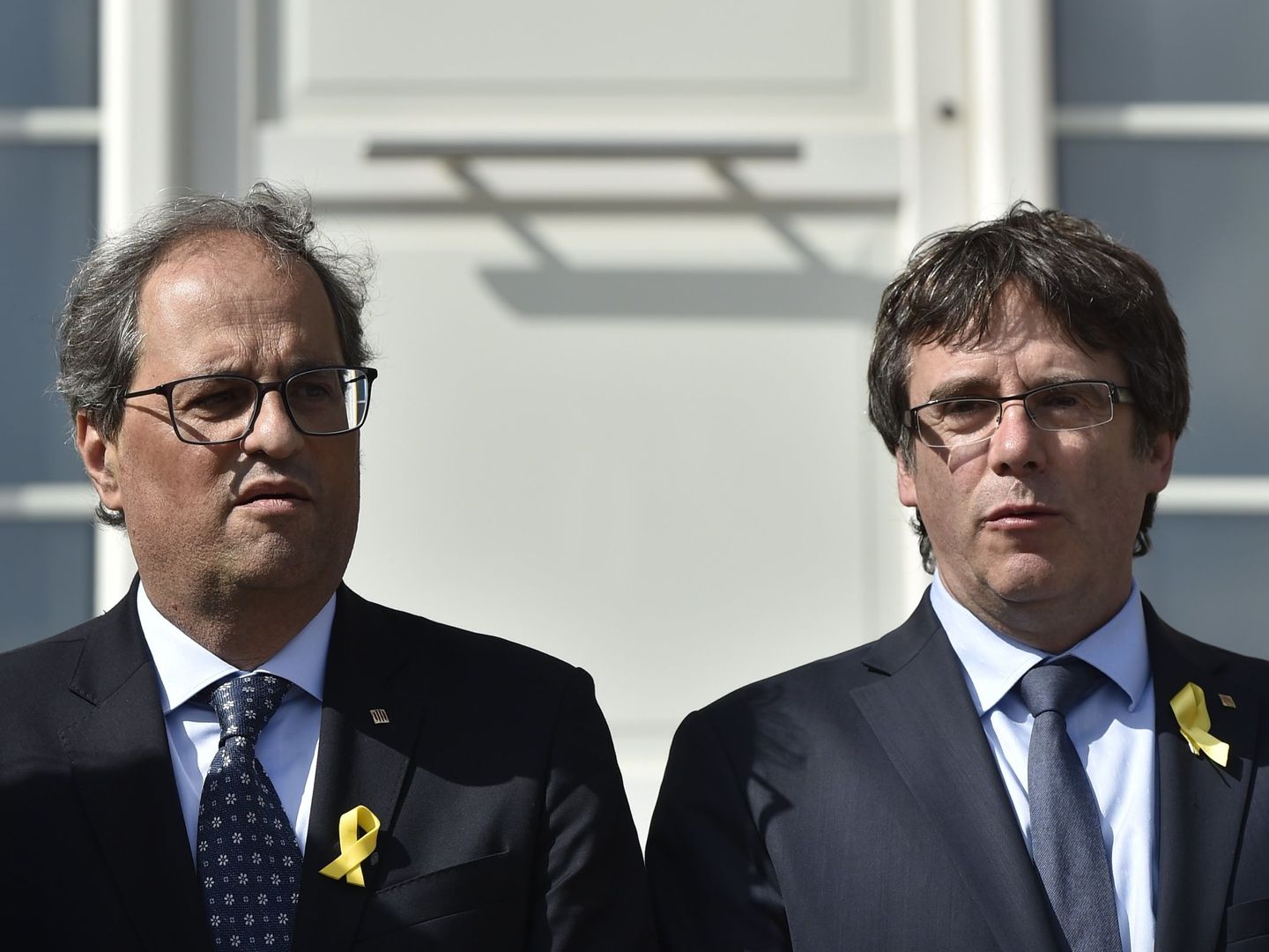 Quim Torra y Carles Puigdemont en Waterloo. (Reuters) 