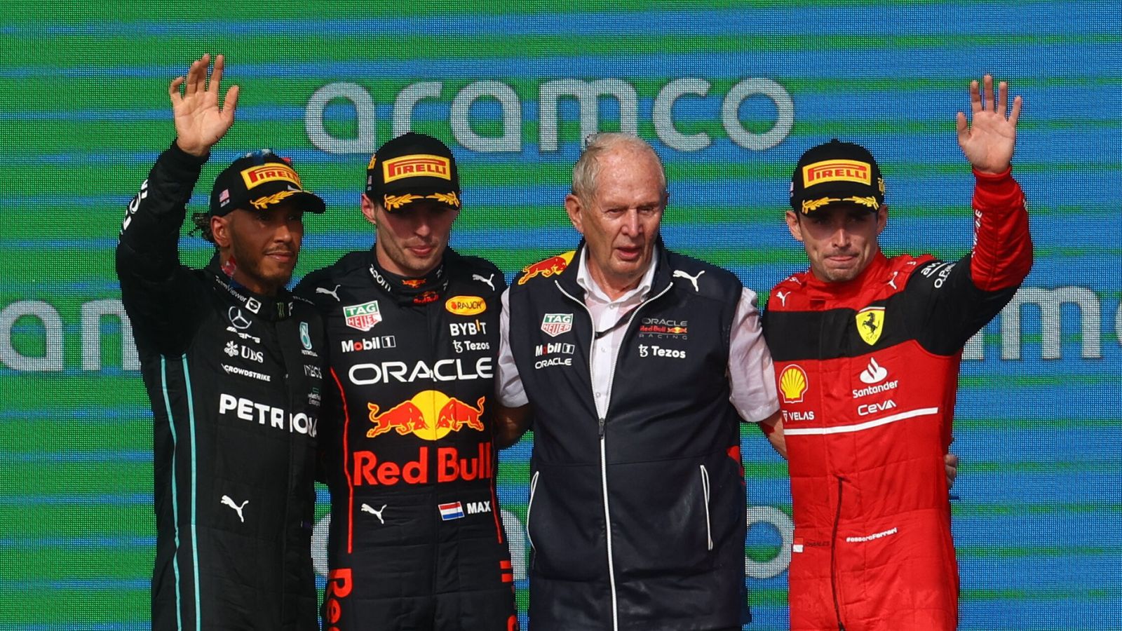Formula One F1 - United States Grand Prix - Circuit of the Americas, Austin, Texas, U.S. - October 23, 2022 Red Bull's Max Verstappen celebrates on the podium after winning the United States Grand Prix with second placed Mercedes' Lewis Hamilton, third placed Ferrari's Charles Leclerc and Red Bull advisor Helmut Marko REUTERS Mike Segar