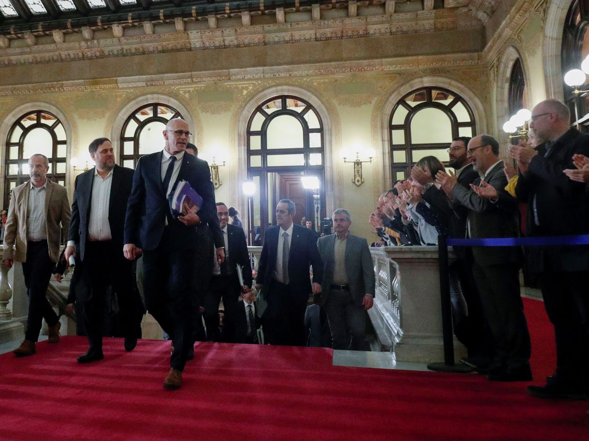 Foto: Oriol Junqueras y Raül Romeva llega al Parlament. (Reuters)