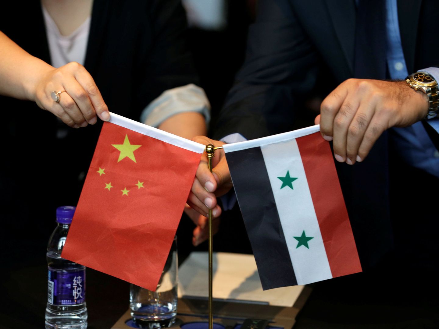 Reunión de empresarios chinos y sirios. (Reuters)