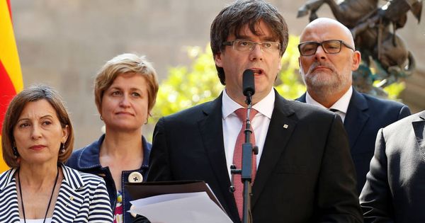 Foto: Carme Forcadell y Carles Puigdemont. (Reuters).