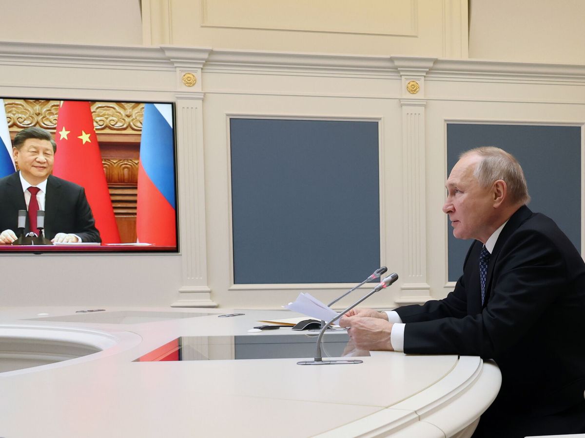 Foto: Reunión telemática entre  Vladímir Putin y Xi Jinping. (EFE/Mikhael Klimentyev)