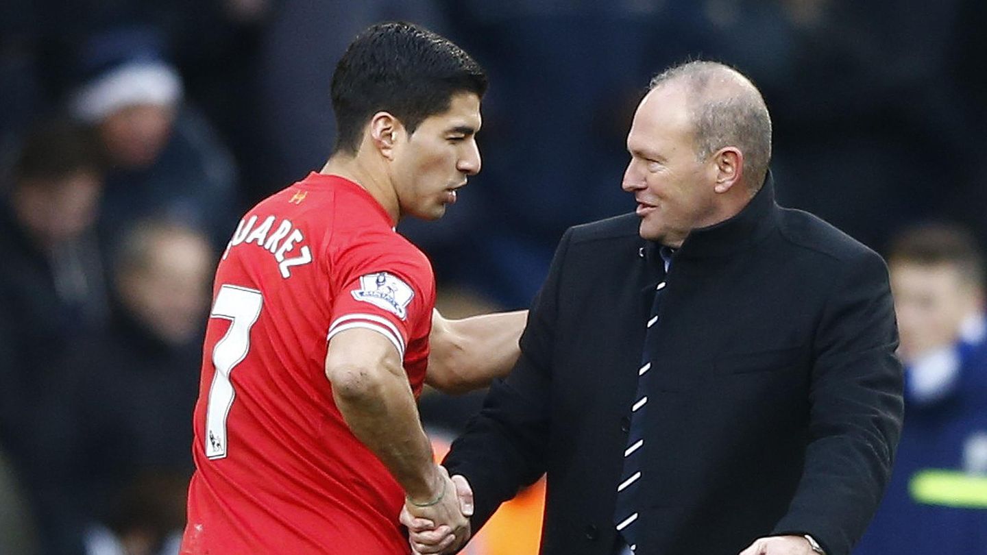 Liverpool's suarez shakes hands with west bromwich albion manager mel following their english premier league soccer match at the hawthorns in west bromwich