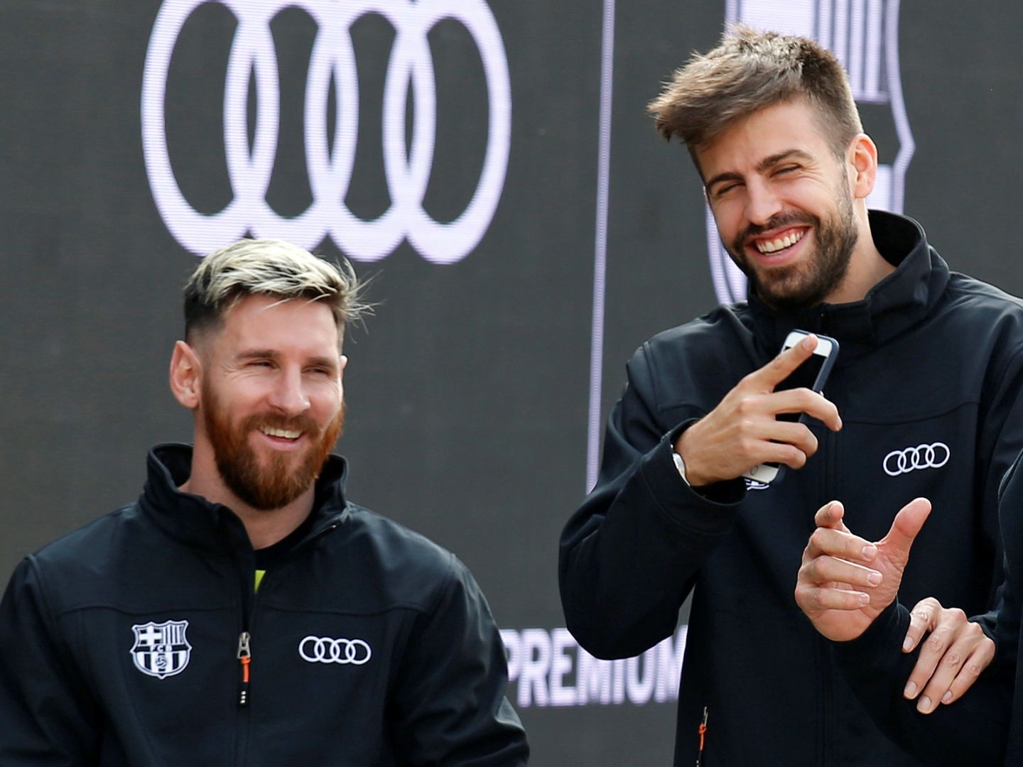 Messi y Piqué, en un acto de Audi, patrocinador del club. (EFE)