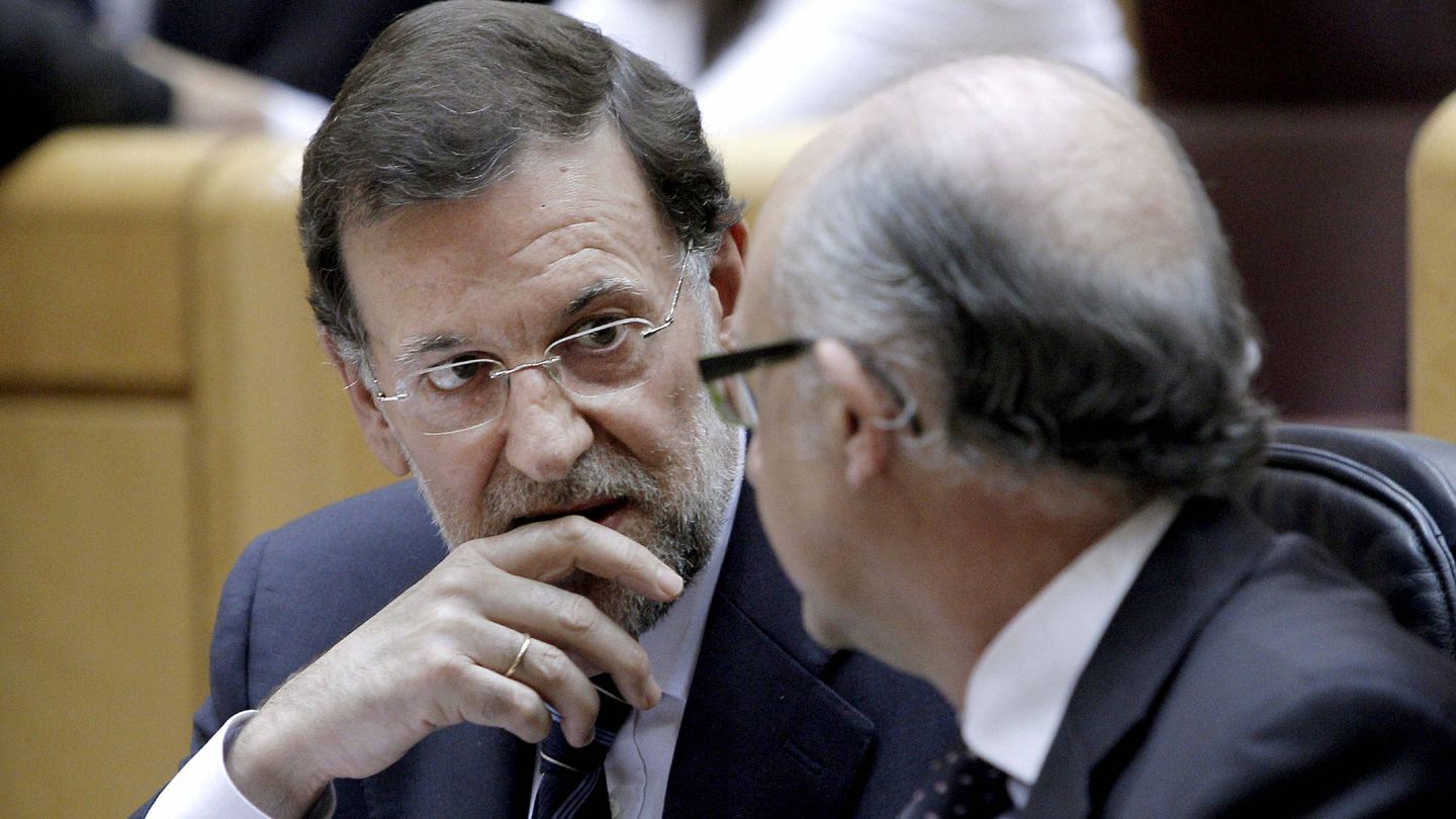 Rajoy y Montoro. (Efe)