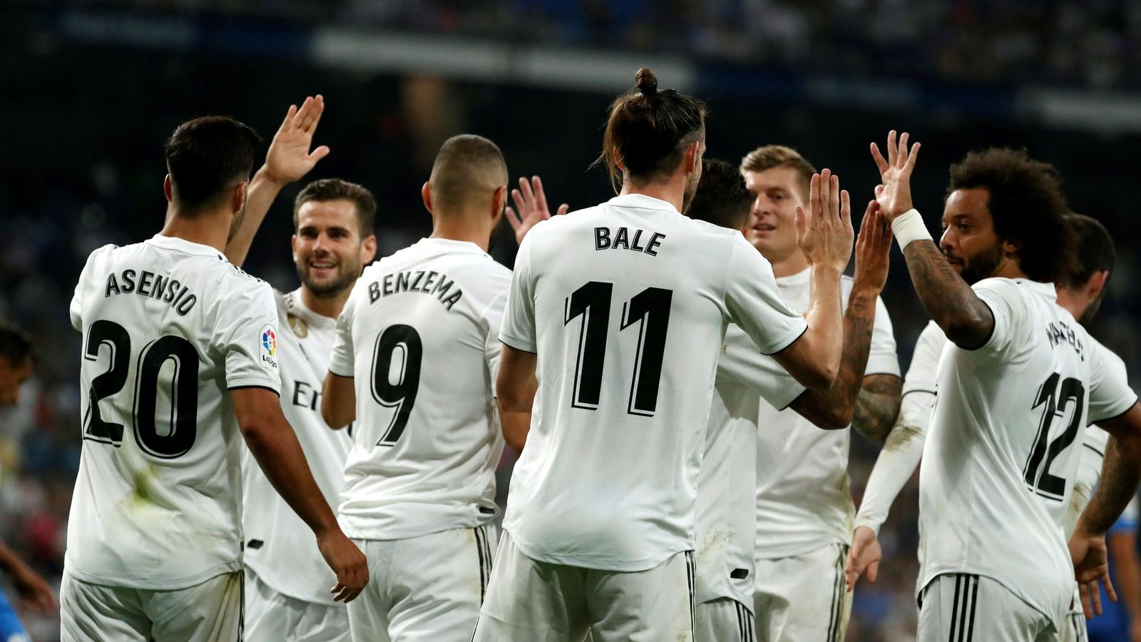 Foto: Los jugadores del Real Madrid celebran el gol de Bale al Getafe en el estreno de Liga. (Efe)