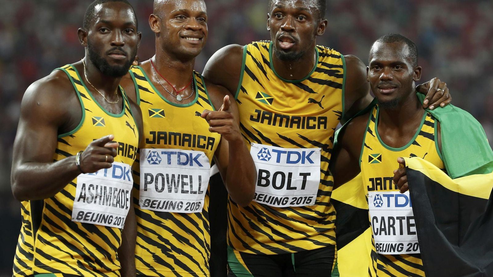 Foto: Ashmeade, Powell, Bolt and Carter of Jamaica react after winning the men's 4x100m relay during the 15th IAAF World Championships at the National Stadium in Beijing