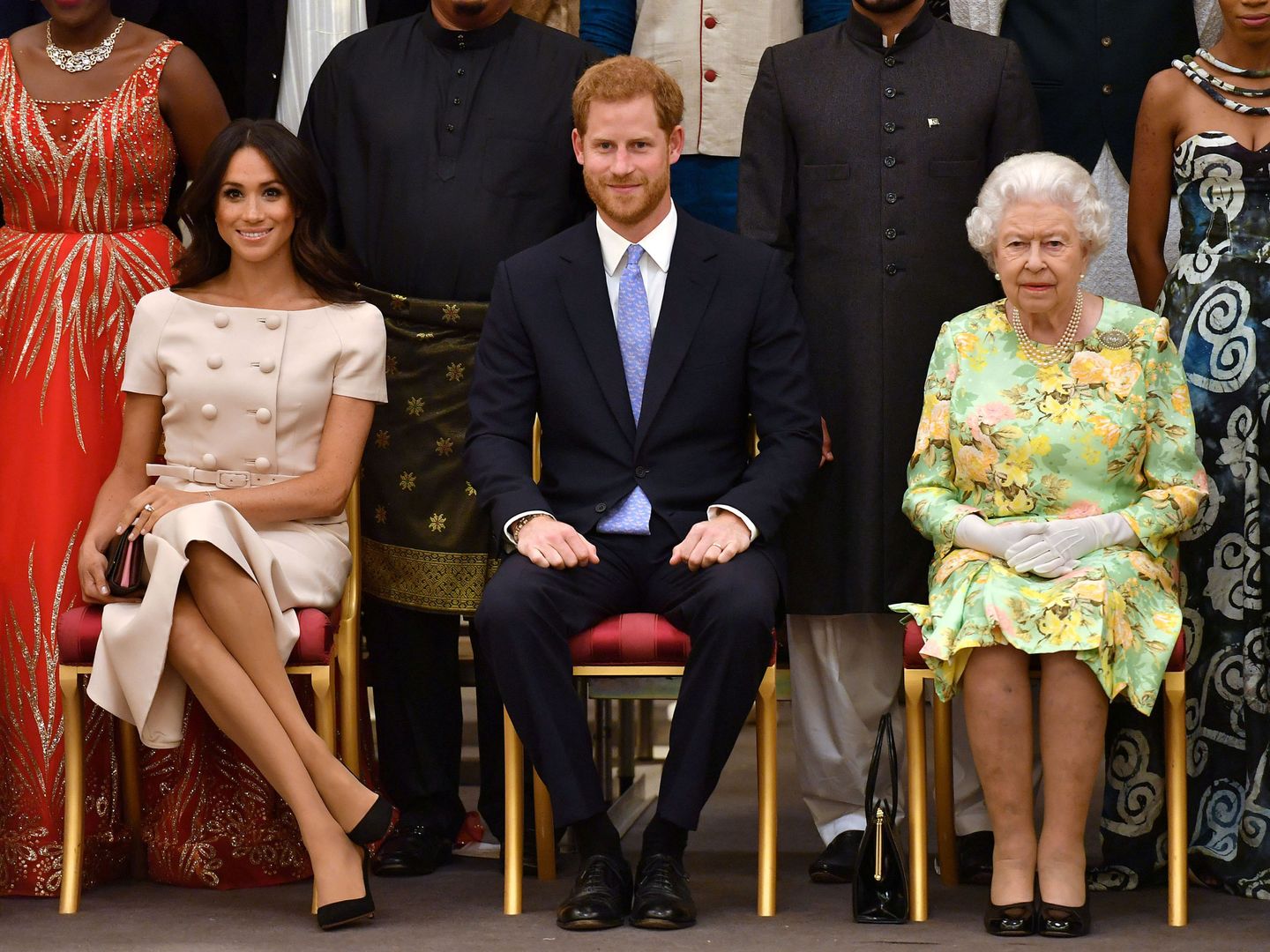 Meghan Markle, el príncipe Harry y la reina Isabel II, en una imagen de archivo. (Reuters)