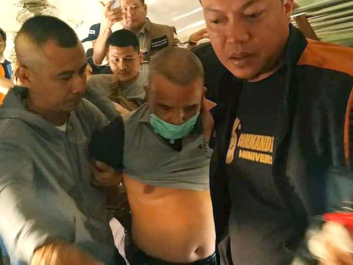 Foto: Somkid Pumpuang en el momento de su detención (EFE)