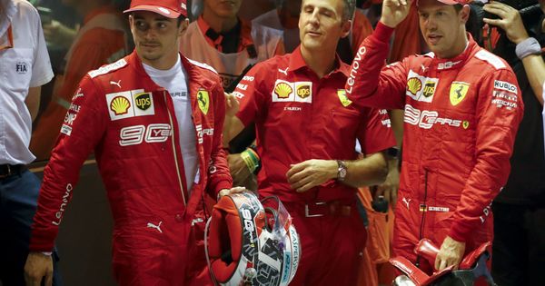 Foto: La estrategia favoreció a un Vettel que lideró el doblete de Ferrari en Singapur. (EFE)