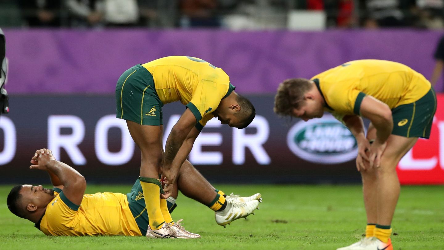 Los jugadores australianos, destrozados tras eliminados. (EFE)