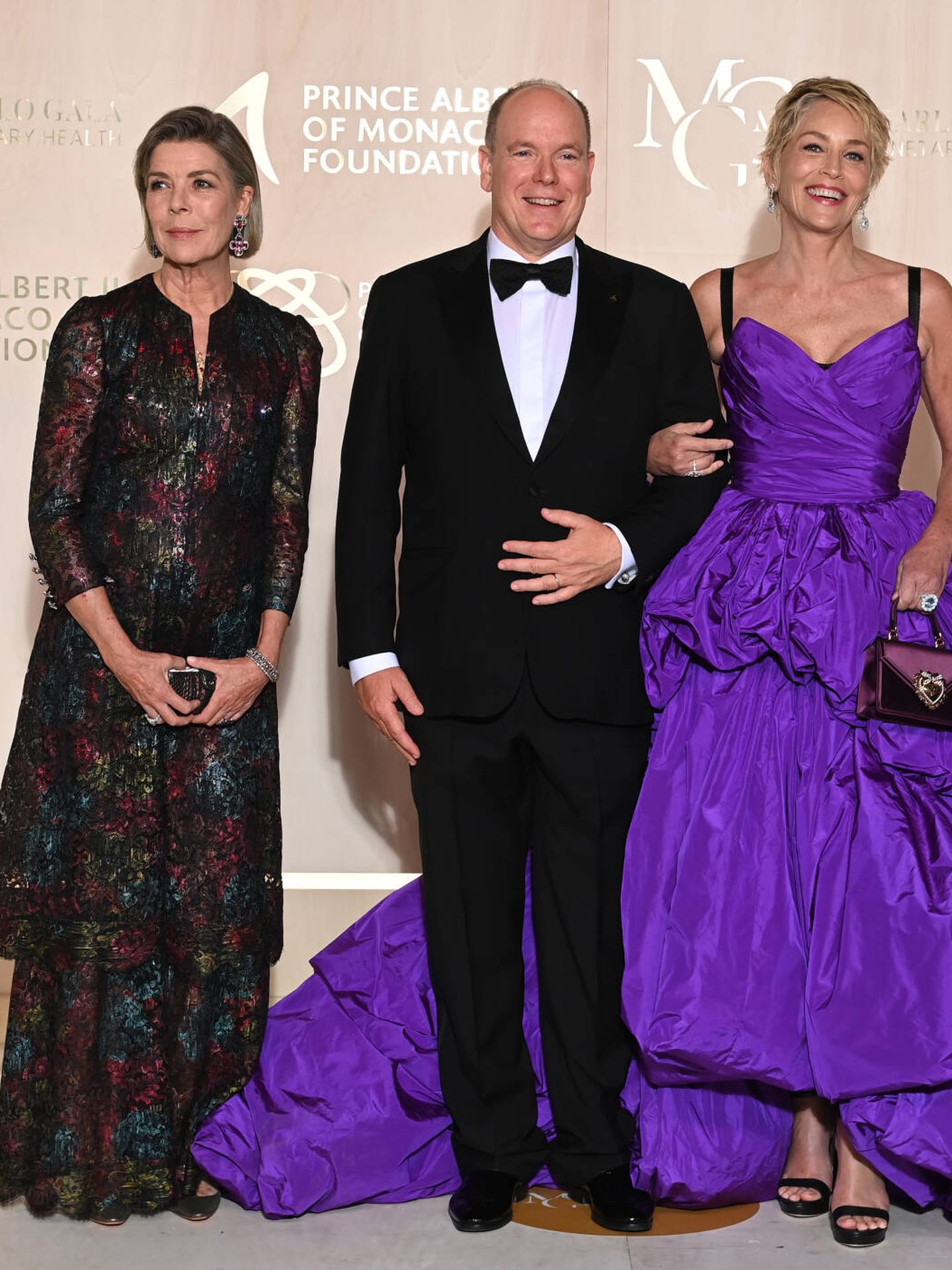 La princesa, con su hermano y Sharon Stone. (Getty Images for La Fondation Prince Albert II de Monaco/Pascal Le Segretain/Getty)