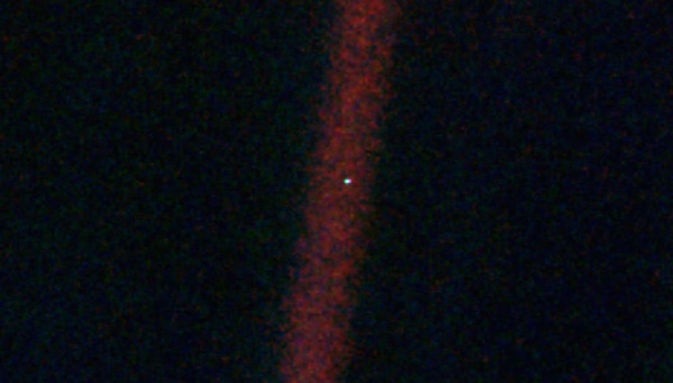 La foto 'Pale Blue Dot' — el punto pálido azul que es la Tierra — tomada por el Voyager 1 en su viaje hacia el exterior del sistema solar el 14 de febrero de 1990 (NASA/JPL)