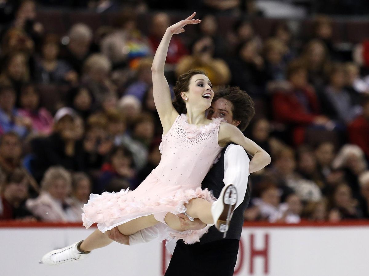 Foto: Alexandra Paul y Mitchell Islam, durante su participación en los campeonatos de Ottawa 2014. (Reuters/Chris Wattie)