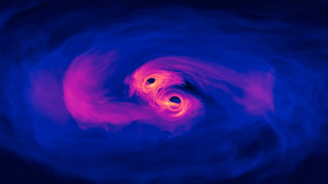 Foto: Simulación de dos agujeros negros a punto de converger. (NASA)
