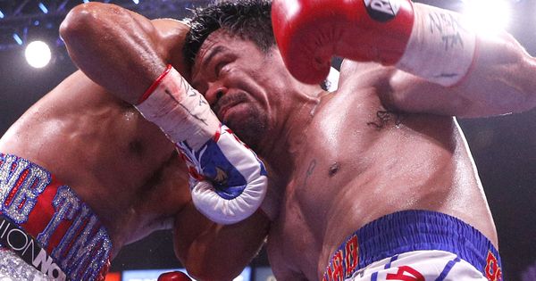 Foto: Manny Pacquiao (d) durante su pelea contra Keith Thurman. (EFE)
