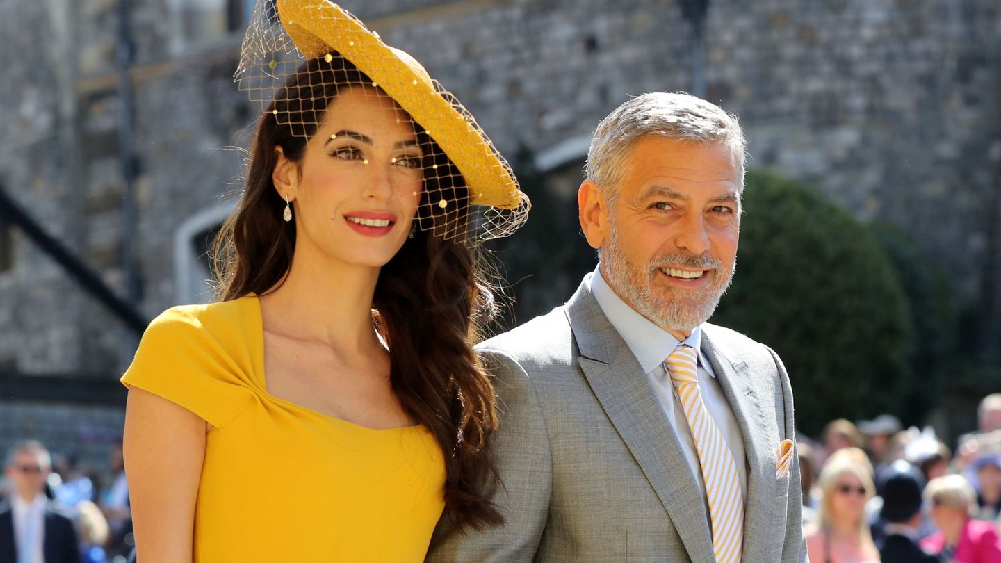 George y Amal Clooney, a su llegada a la capilla de San Jorge para asistir a la boda de Harry y Meghan. (Reuters)