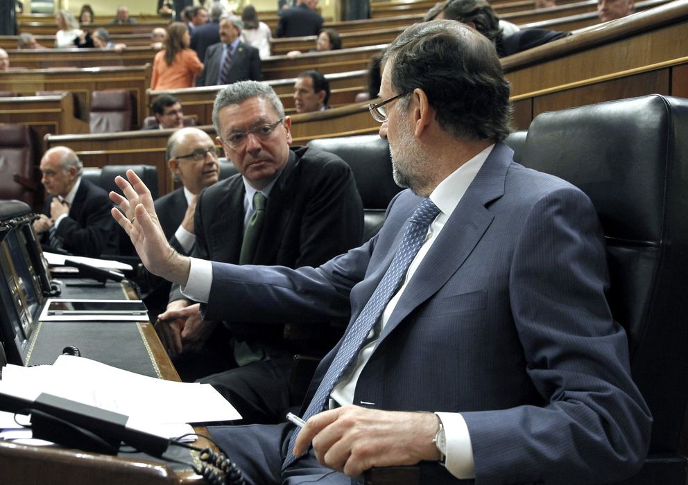 Foto: Alberto Ruiz-Gallardón y Mariano Rajoy, en el Congreso (Efe)