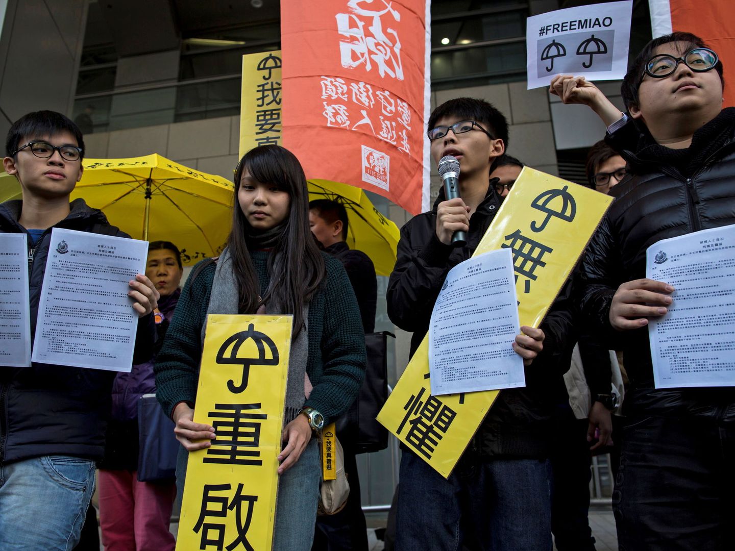 Oscar Lai, Agnes Chow, Joshua Wong and Derek en 2015. (Reuters)