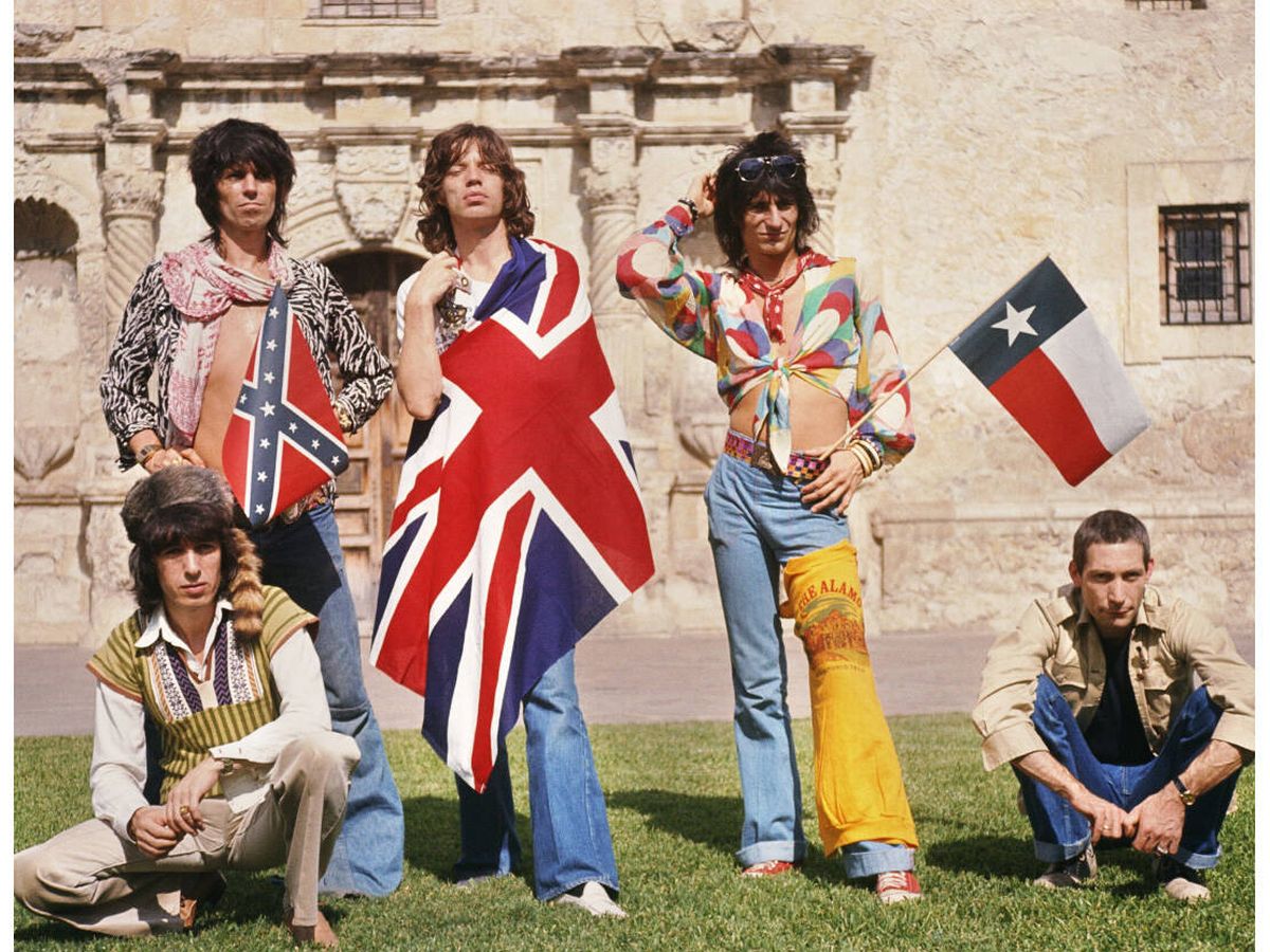Foto: Rolling Stones envueltos en la bandera británica. (Cedida)
