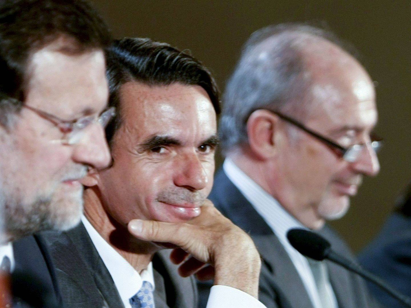 Foto de archivo de Rajoy, Aznar y Rato. (EFE)