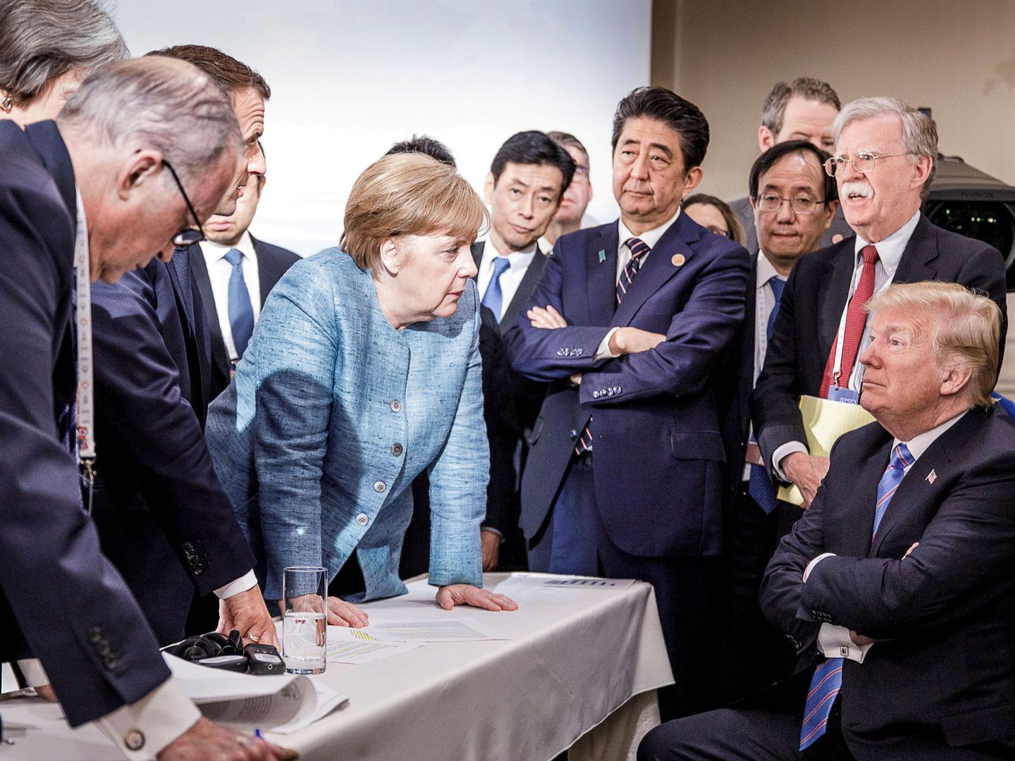 Merkel y Trump, en la cumbre del G-7 de 2018. (Reuters)