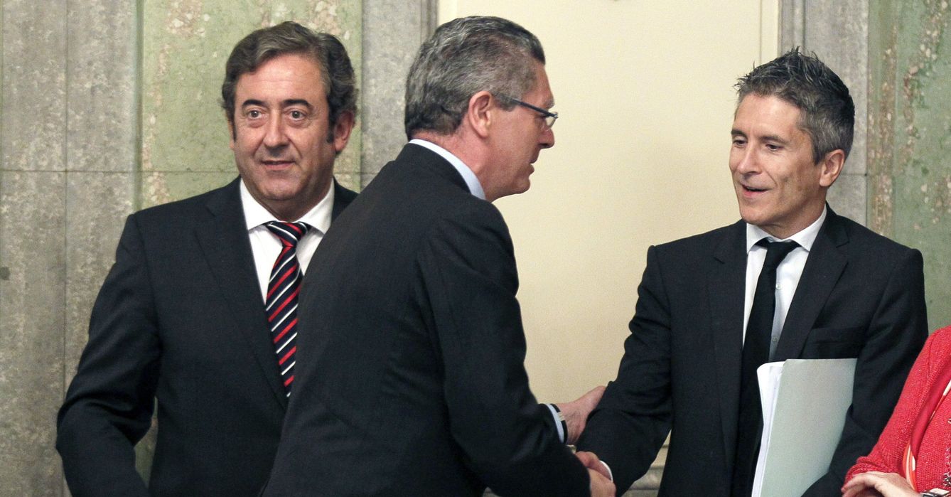 El fiscal Javier Zaragoza, el entonces ministro de Justicia, Alberto Ruiz-Gallardón, y Grande-Marlaska. (EFE)