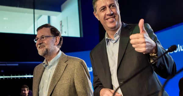 Foto: El presidente del Gobierno, Mariano Rajoy, junto al candidato del PPC, Xavier García Albiol, en un acto en Lleida. (EFE)