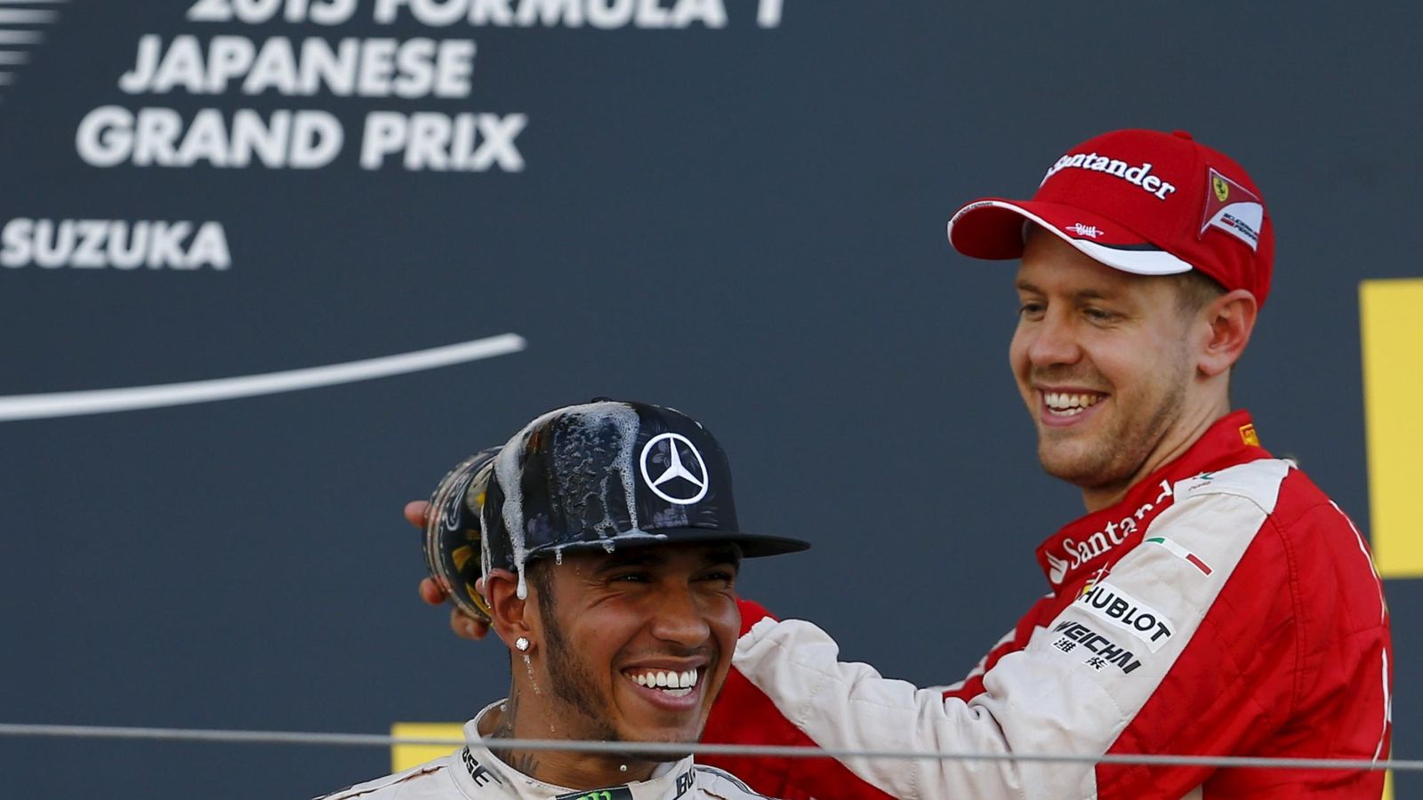 Foto: Hamilton y Vettel en el podio del GP de Japón (Reuters).
