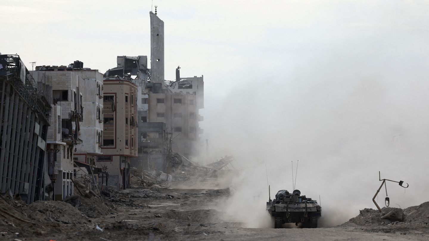 An Israeli tank operates, amid the ongoing ground operation of the Israeli army against Palestinian Islamist group Hamas, in the northern Gaza Strip, November 22, 2023.  REUTERS Ronen Zvulun  EDITOR'S NOTE: REUTERS PHOTOGRAPHS WERE REVIEWED BY THE IDF AS PART OF THE CONDITIONS OF THE EMBED. NO PHOTOS WERE REMOVED.     TPX IMAGES OF THE DAY
